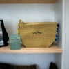 Lazy Days Beach Clutch Bag<br><b style="color: #03236a;">JBAU1618</b><br><b style="color: #03236a;">Coloured Pom Poms</b>